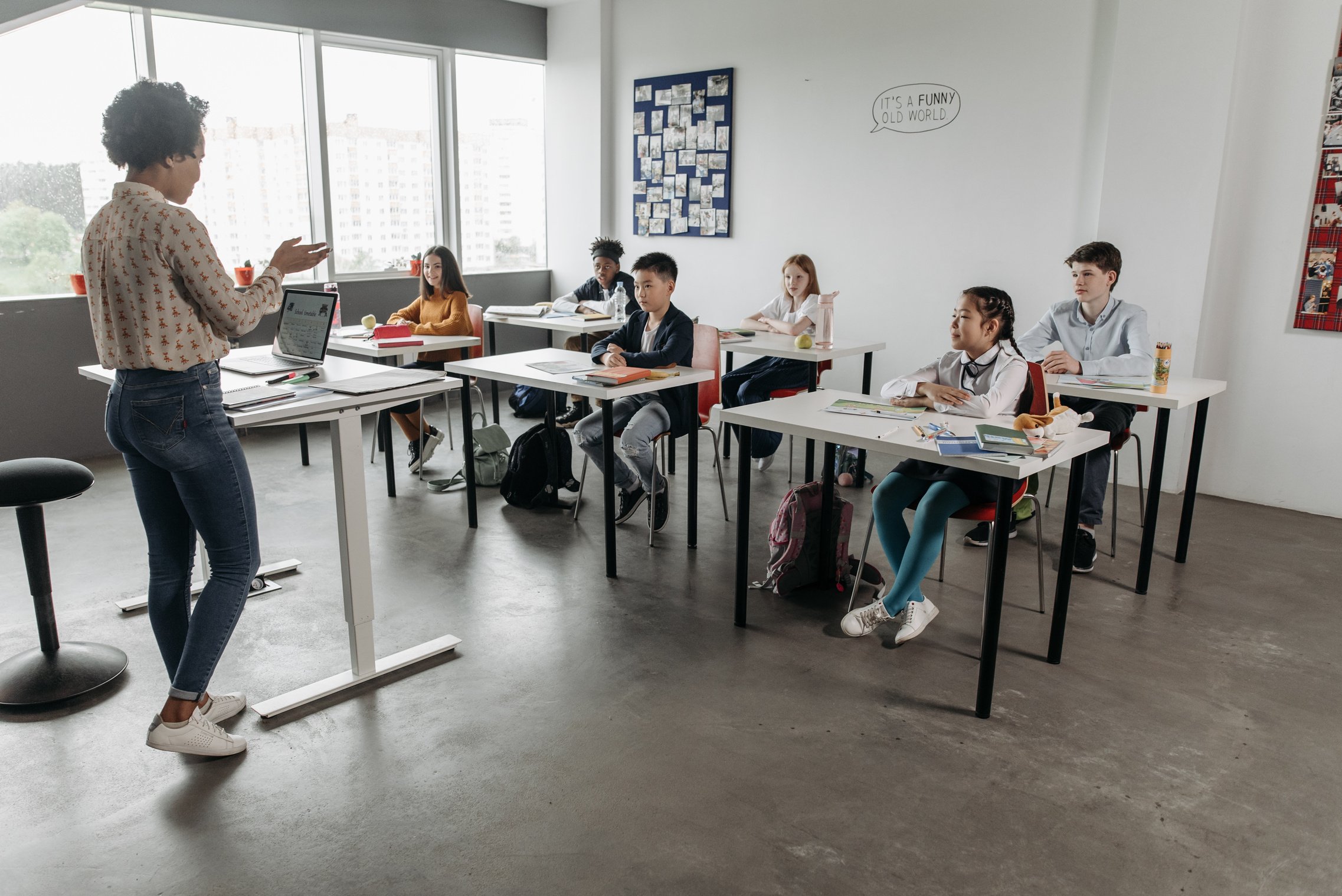 A Teacher and Students Inside a Classroom